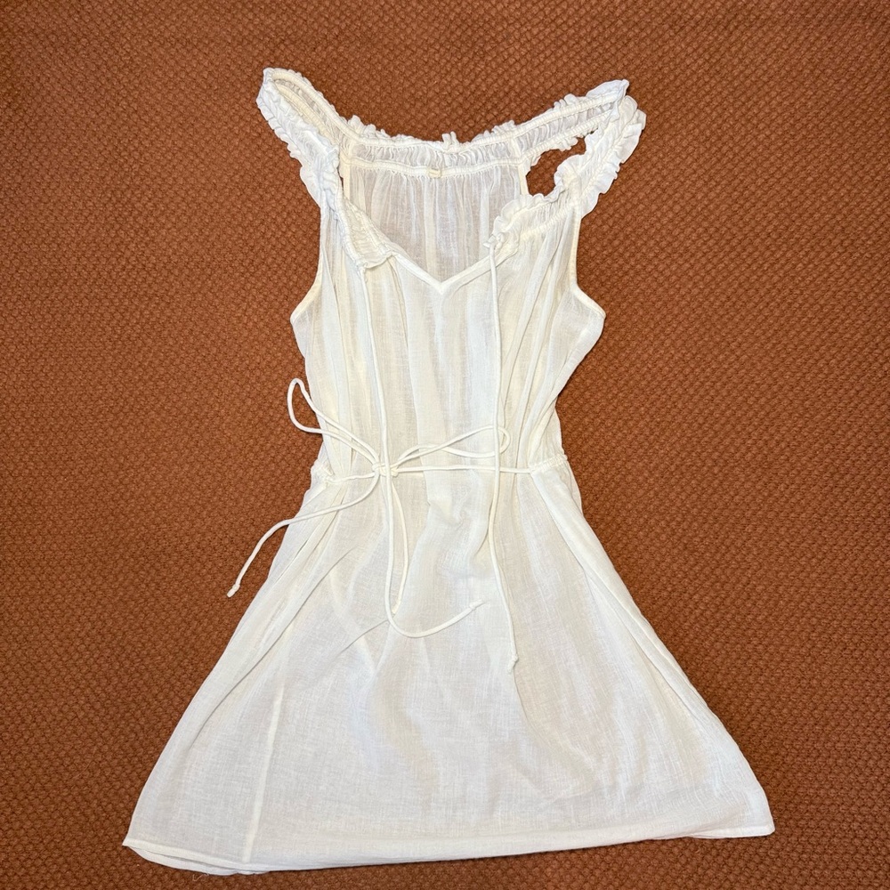 J. Crew White 100% cotton mini dress / coverup with ruffles and tie waist.